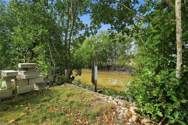 a view of a backyard of the house