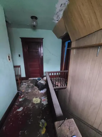 a view of an empty room and window