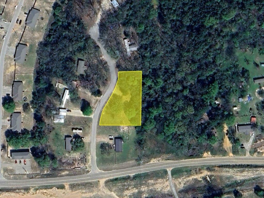 16958 Springcrest Lane Lindale, TX 75771 - Photo 6 of 8 an aerial view of a house with swimming pool