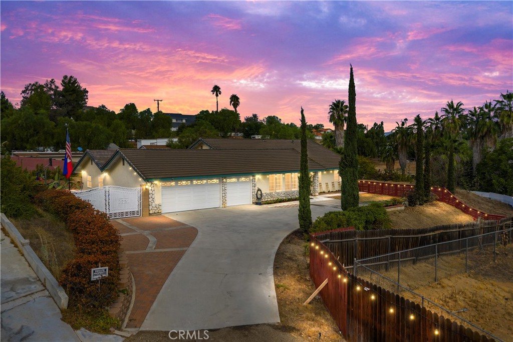 6452 Valley Drive Riverside, CA 92505 - Photo 1 of 1 Front view of Riverside single-family home with landscaped yard and driveway.