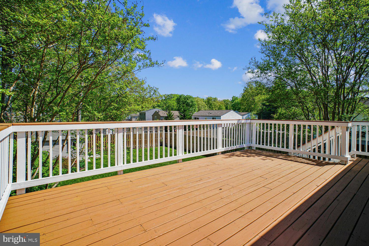 8491 Rippled Creek Court Springfield, VA 22153 - Photo 18 of 40 a view of balcony with wooden floor and fence