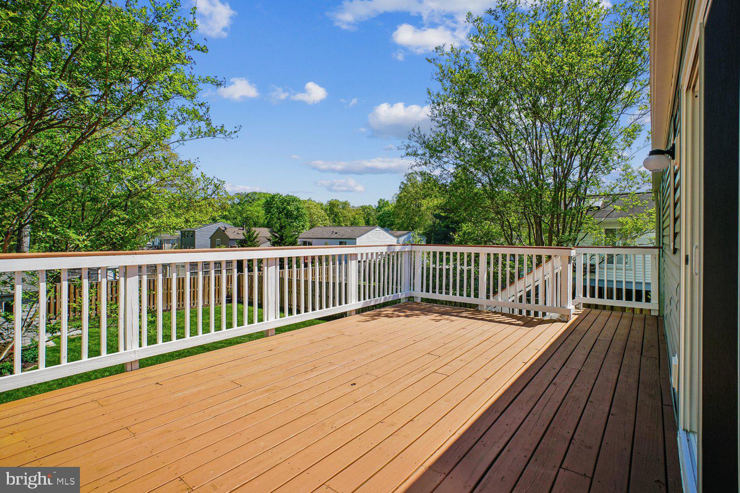 8491 Rippled Creek Court Springfield, VA 22153 - Photo 19 of 40 a view of balcony with wooden floor and fence