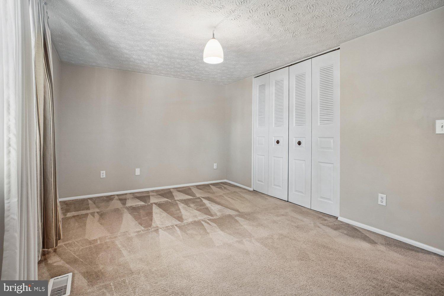 8491 Rippled Creek Court Springfield, VA 22153 - Photo 22 of 40 a view of an empty room