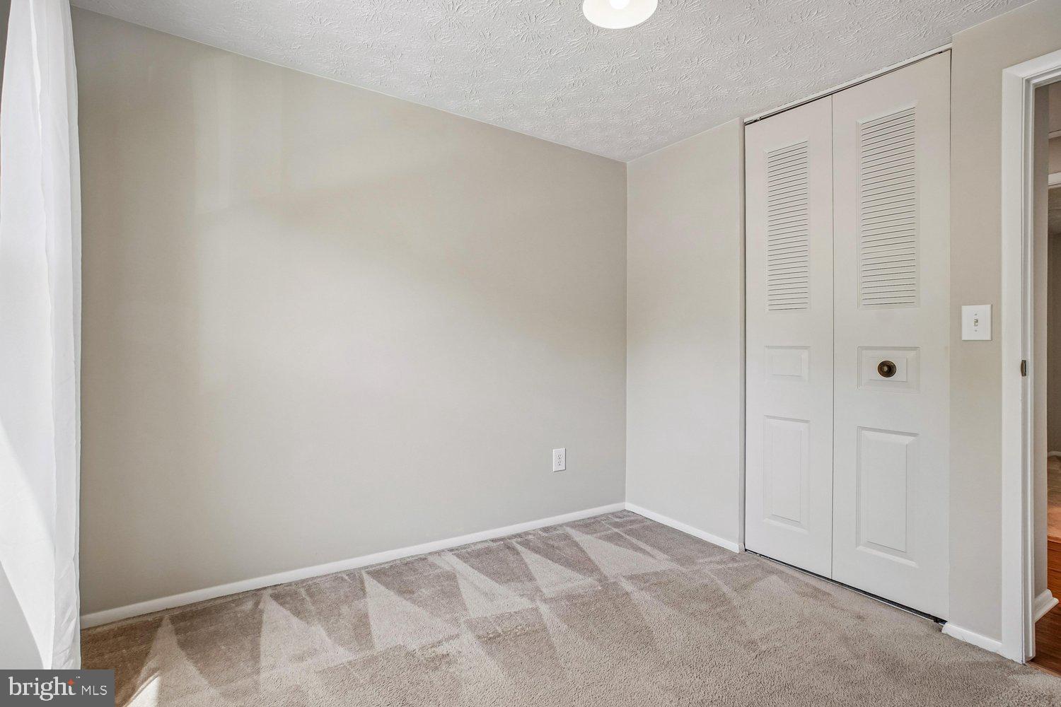 8491 Rippled Creek Court Springfield, VA 22153 - Photo 24 of 40 a view of an empty room