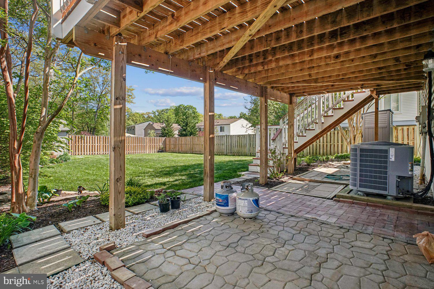 8491 Rippled Creek Court Springfield, VA 22153 - Photo 35 of 40 a view of a porch with furniture and garden
