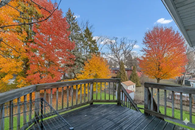 a view of a wooden roof deck