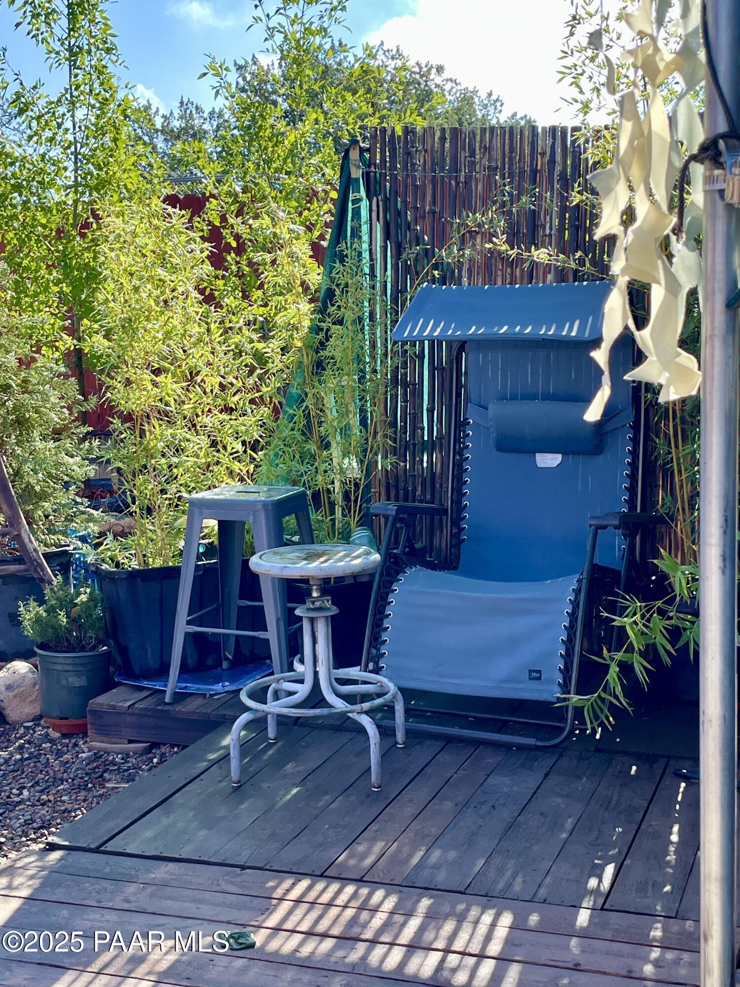 4701 North Valancius Way Rimrock, AZ 86335 - Photo 19 of 35 a wooden bench sitting in front of a building