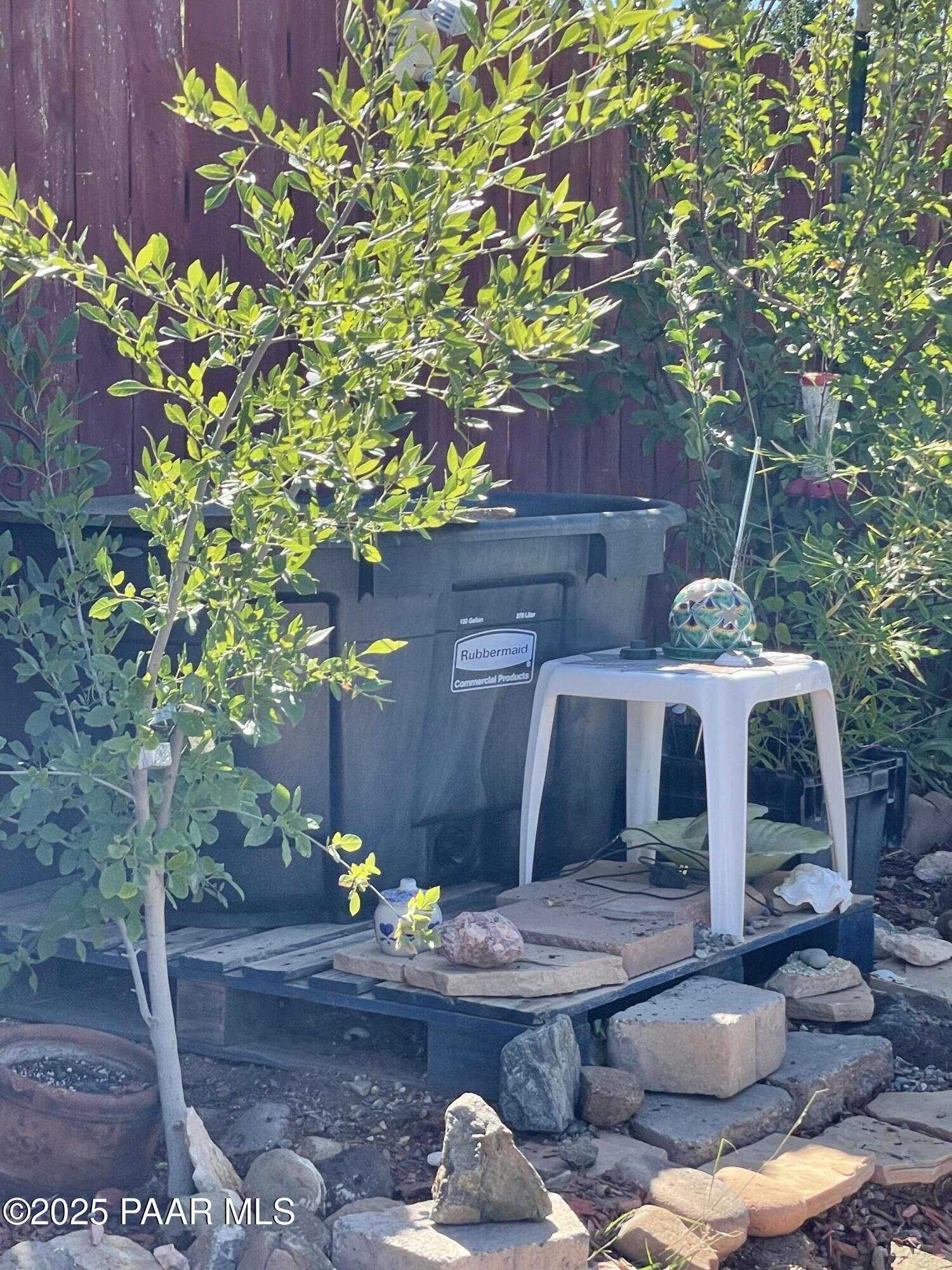 4701 North Valancius Way Rimrock, AZ 86335 - Photo 20 of 35 a patio with table and chairs potted plants