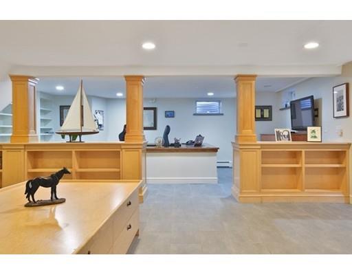 7 Deer Run Road Lincoln, MA 01773 - Photo 24 of 30 a living room with kitchen island and a couch