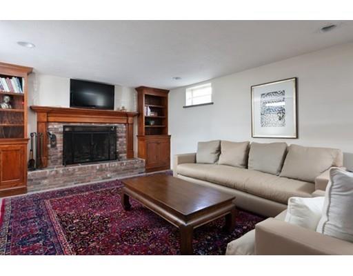 7 Deer Run Road Lincoln, MA 01773 - Photo 26 of 30 a living room with furniture and a fireplace
