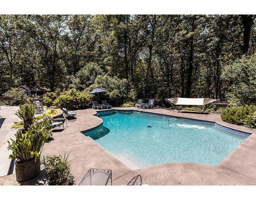 7 Deer Run Road Lincoln, MA 01773 - Photo 29 of 30 a view of a swimming pool with a yard