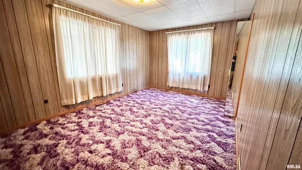 a large bed in a balcony