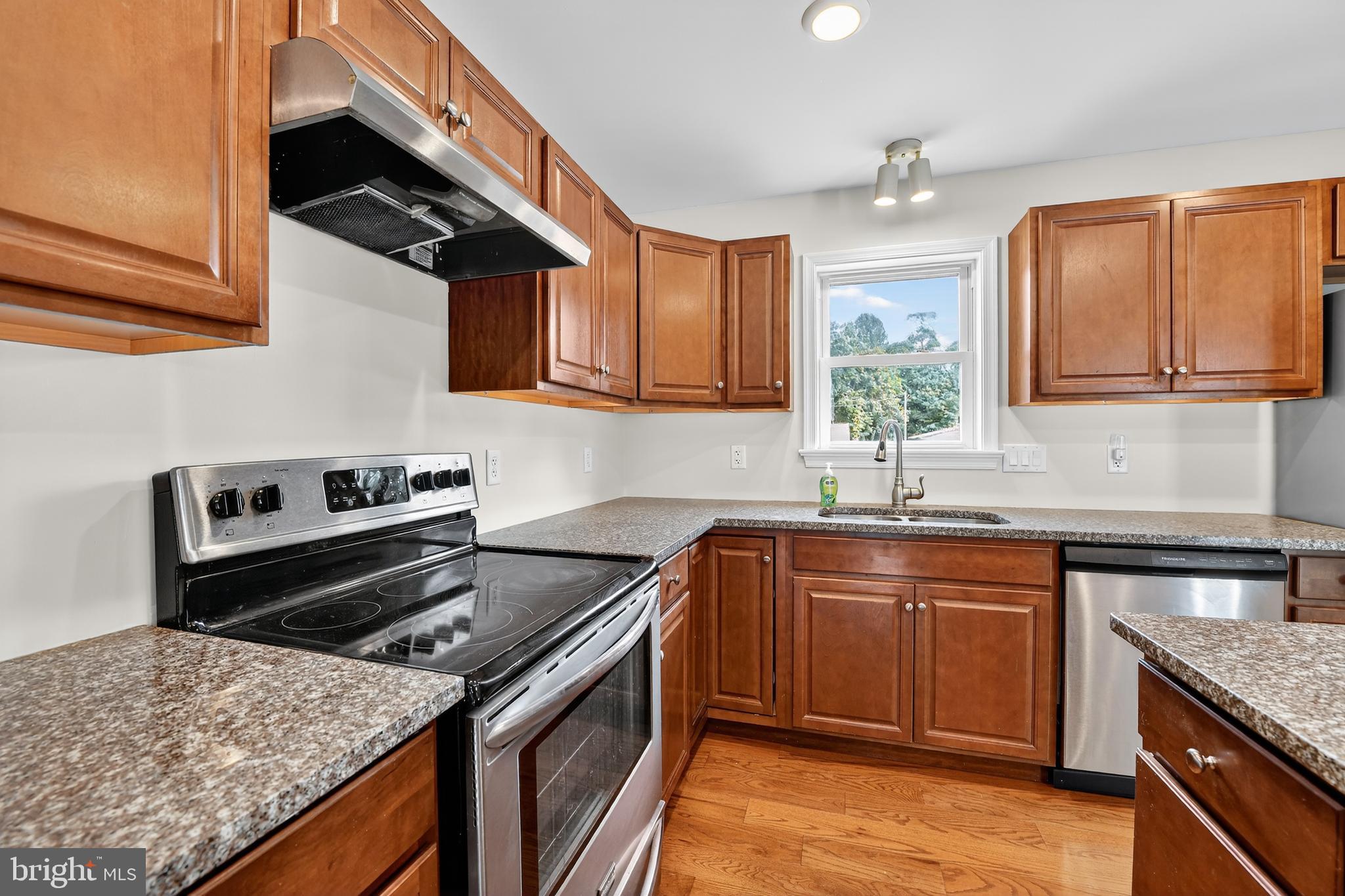 1 Spring Avenue Temple, PA 19560 - Photo 8 of 34 a kitchen with a stove and a sink