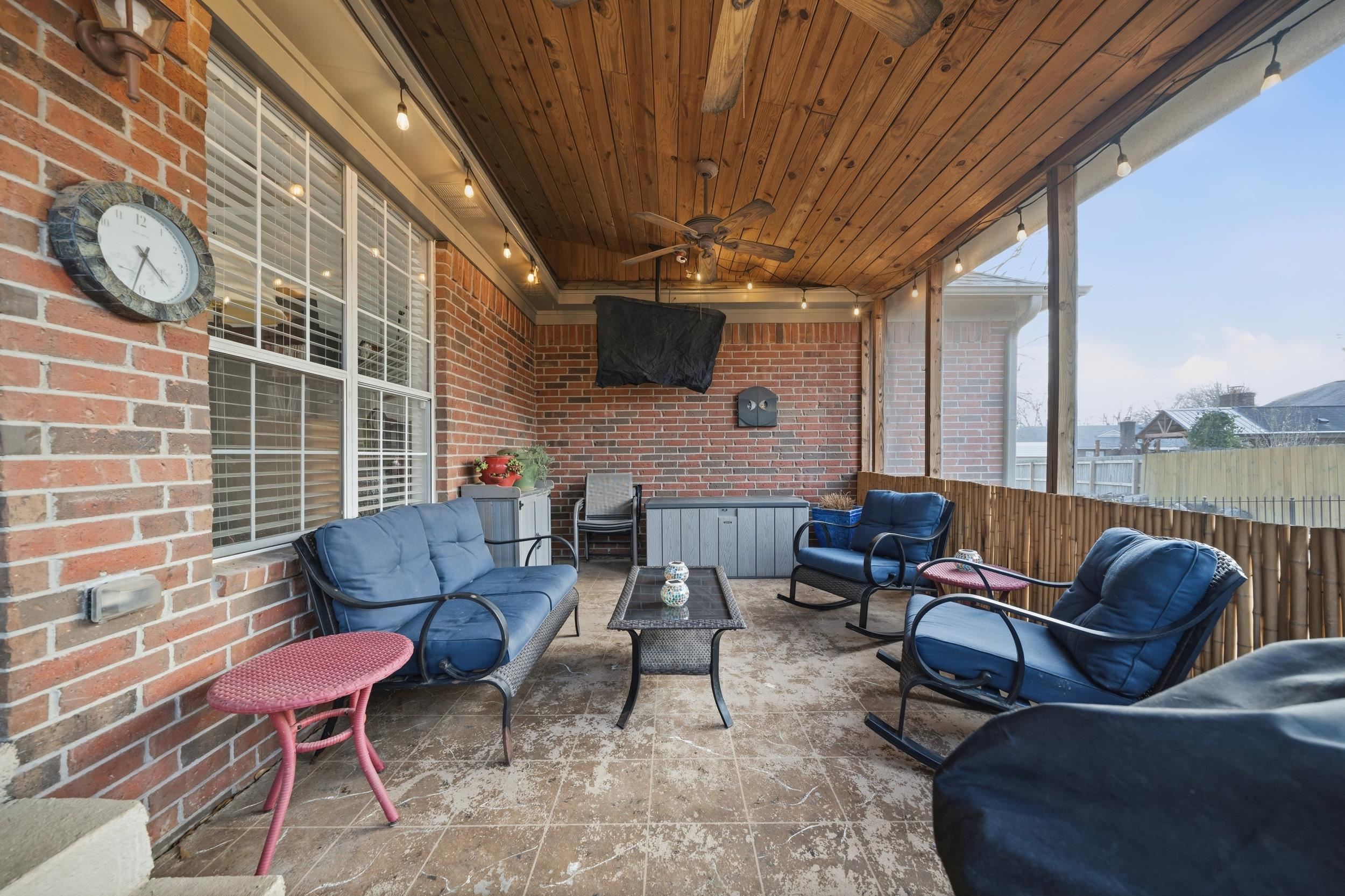 307 John Cove Collierville, TN 38017 - Photo 10 of 25 View of patio with an outdoor lounge area, ceiling fan, and a sunroom