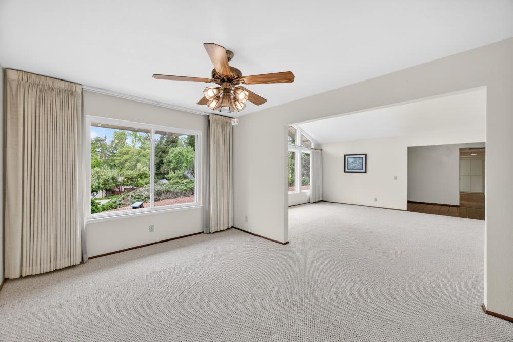 4071 Silver Street Rocklin, CA 95677 - Photo 18 of 70 a view of a livingroom with a ceiling fan and window