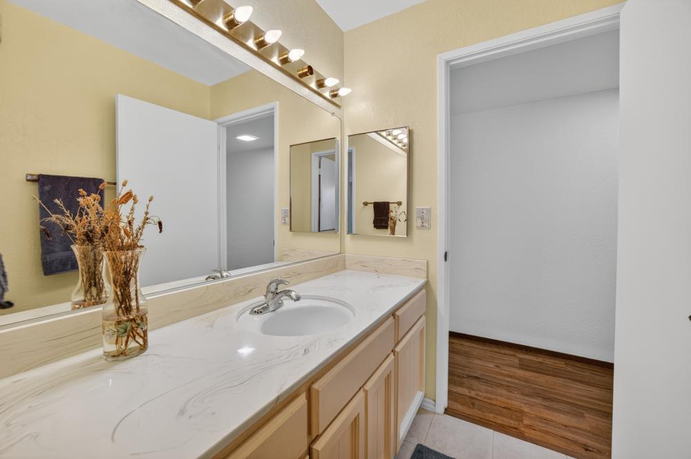 4071 Silver Street Rocklin, CA 95677 - Photo 26 of 70 a bathroom with a sink and a mirror