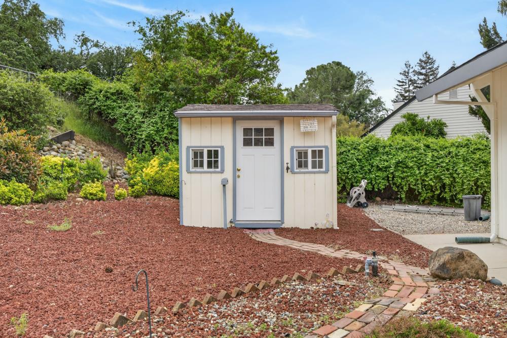 4071 Silver Street Rocklin, CA 95677 - Photo 44 of 70 a view of a house with a yard and garage