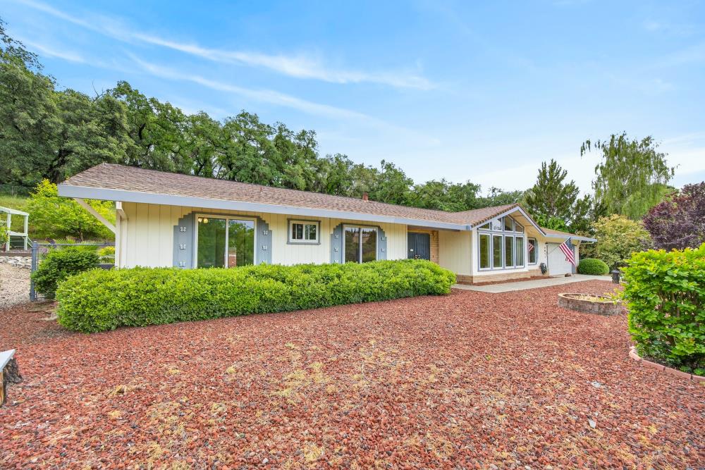 4071 Silver Street Rocklin, CA 95677 - Photo 49 of 70 a front view of a house with a yard and a garage