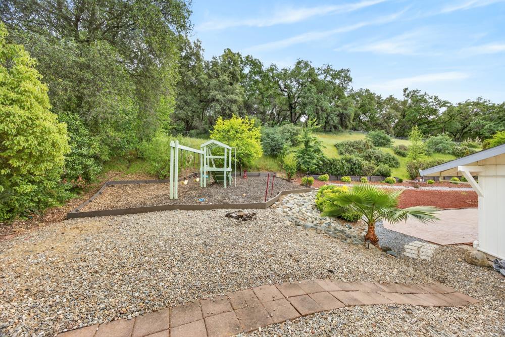 4071 Silver Street Rocklin, CA 95677 - Photo 5 of 70 a backyard of a house with lots of green space