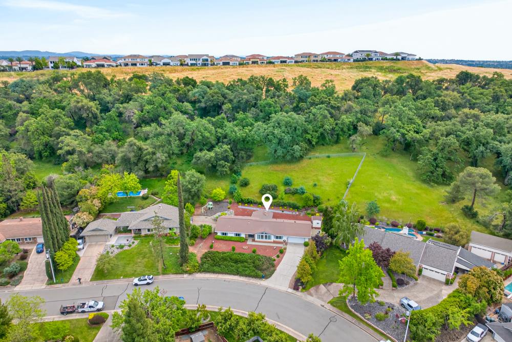 4071 Silver Street Rocklin, CA 95677 - Photo 55 of 70 an aerial view of residential houses with outdoor space and swimming pool