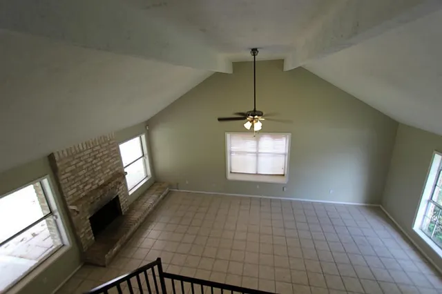 a view of an empty room and window