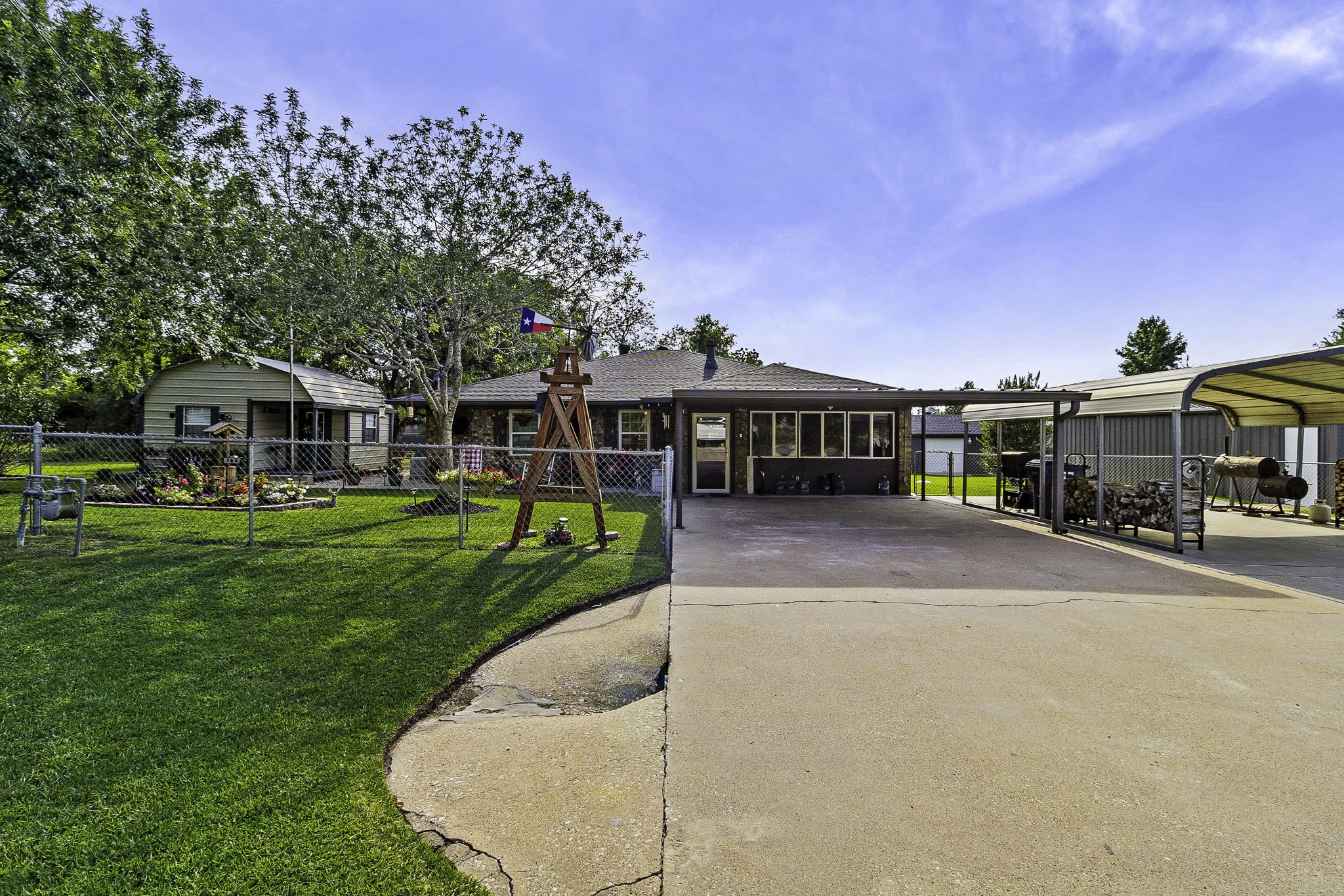 188 Huckleberry Road Onalaska, TX 77360 - Photo 2 of 49 front view of a house with a yard
