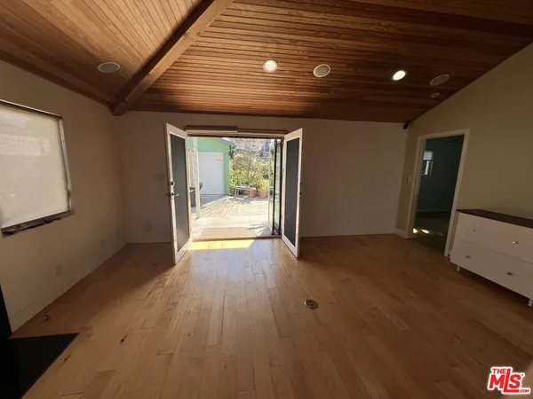 a view of a livingroom with wooden floor