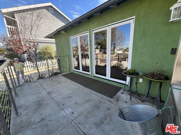 a backyard of a house with seating space