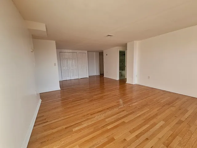 a bed room with a bed and a table