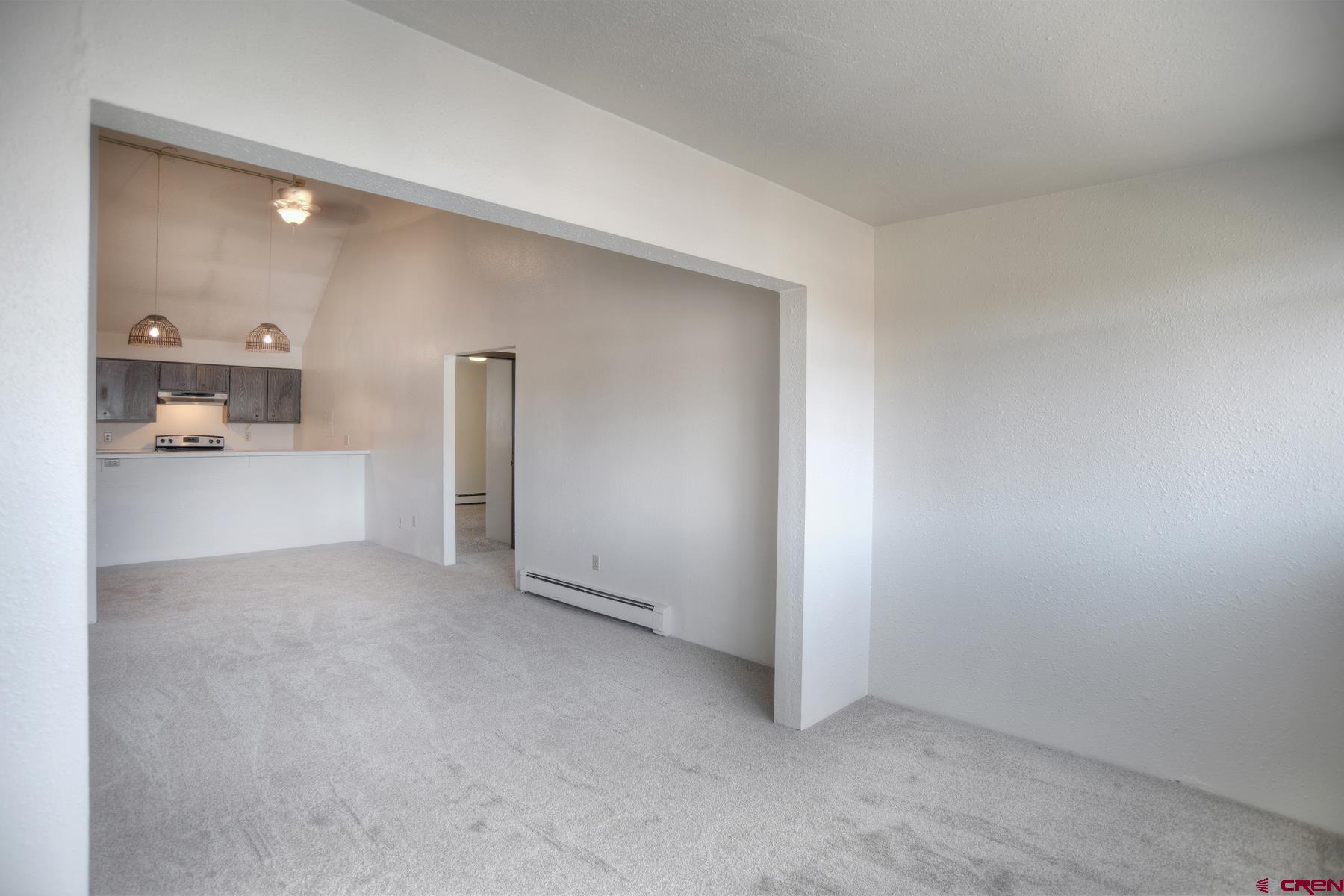 1135 Florida Road, Unit C27 Durango, CO 81301 - Photo 11 of 16 a view of a livingroom and a kitchen