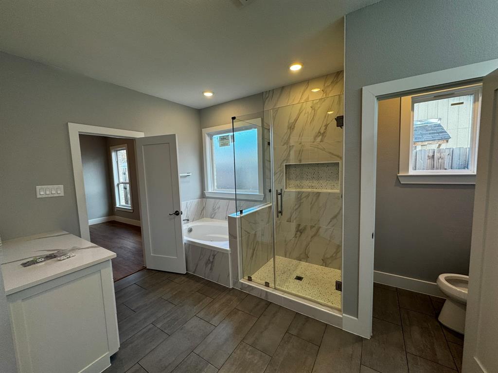 2533 Jonesboro Avenue Dallas, TX 75228 - Photo 13 of 27 a bathroom with a shower