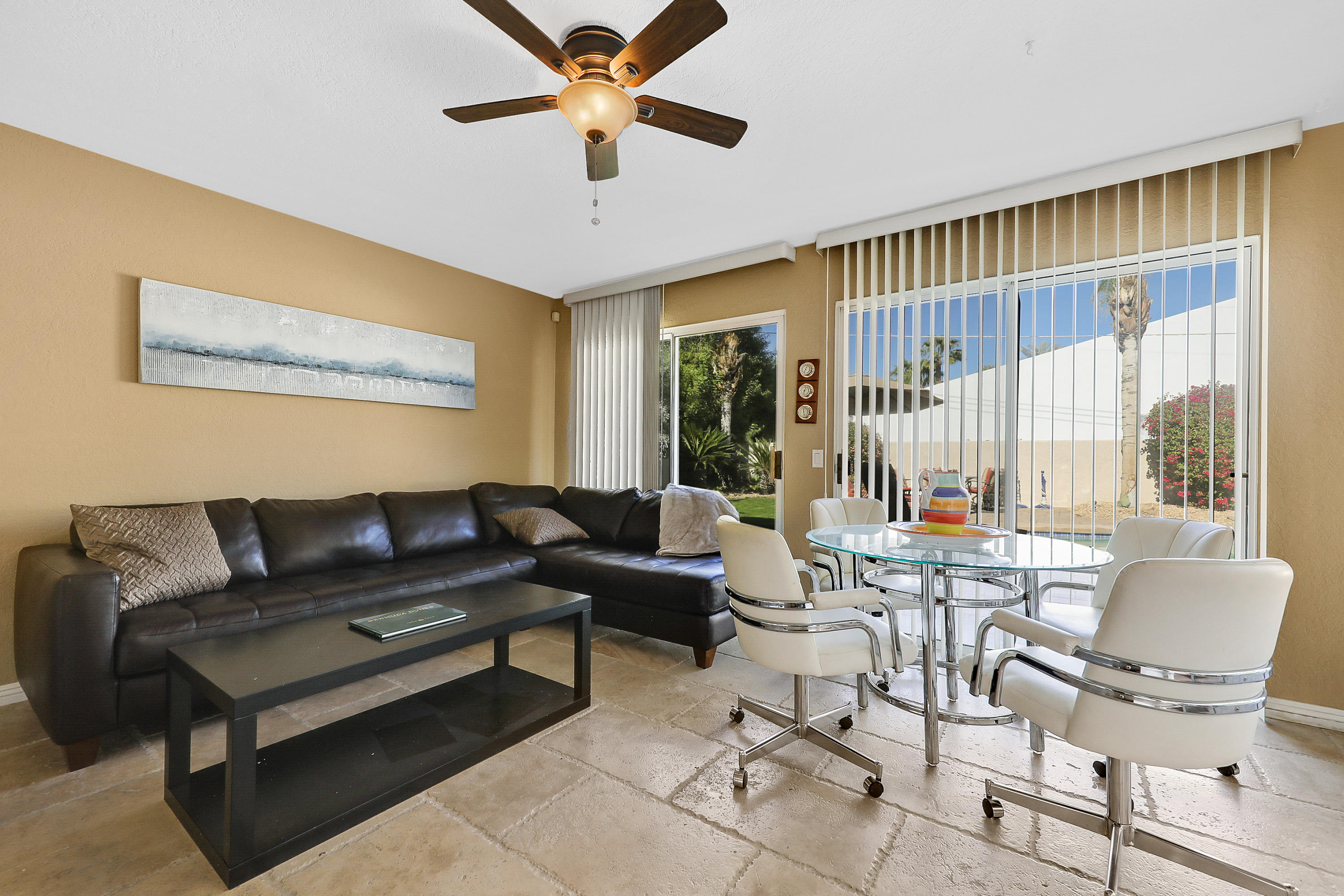 78950 Starlight Lane Bermuda Dunes, CA 92203 - Photo 11 of 32 a living room with furniture and a large window
