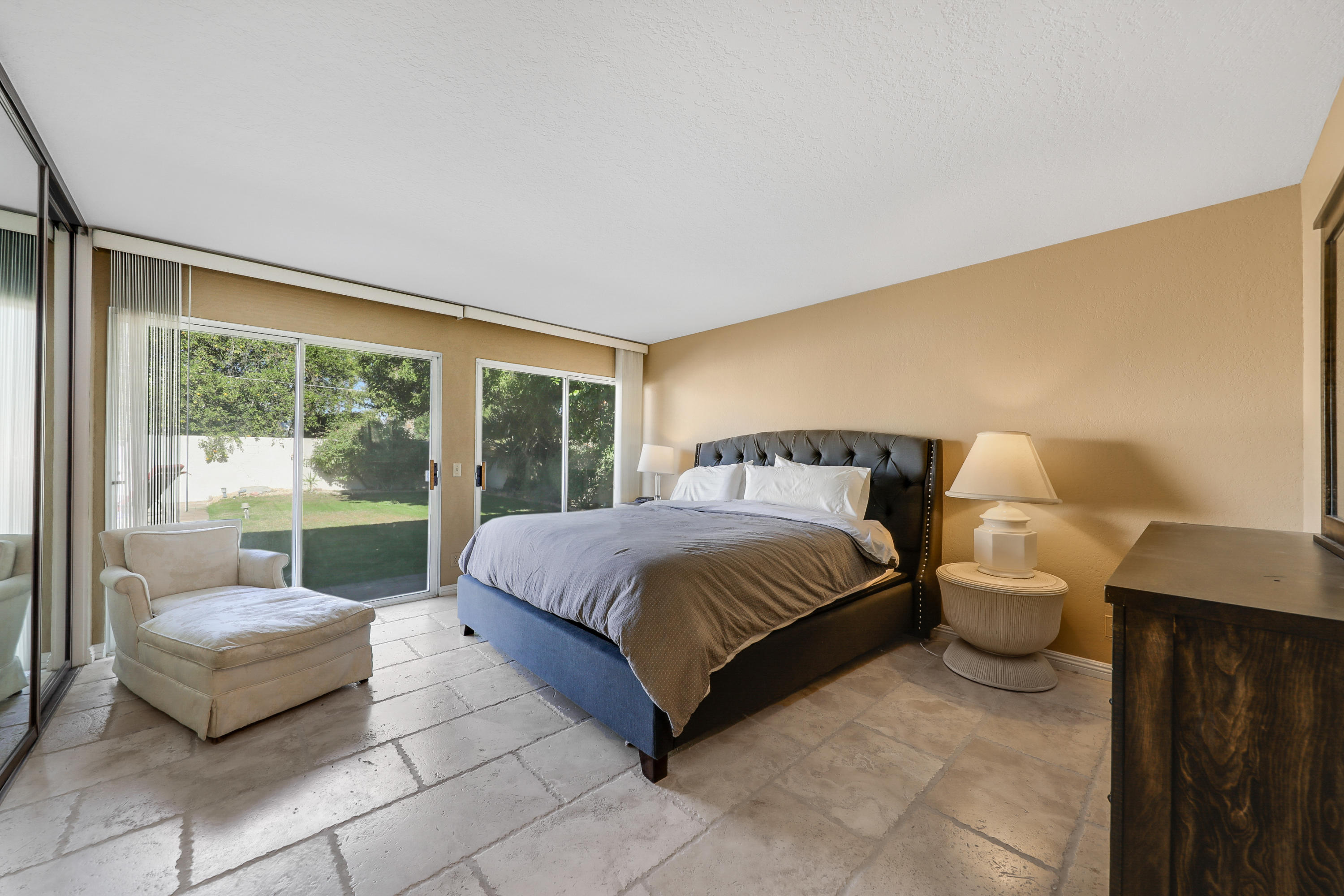 78950 Starlight Lane Bermuda Dunes, CA 92203 - Photo 15 of 32 a bedroom with a bed and window
