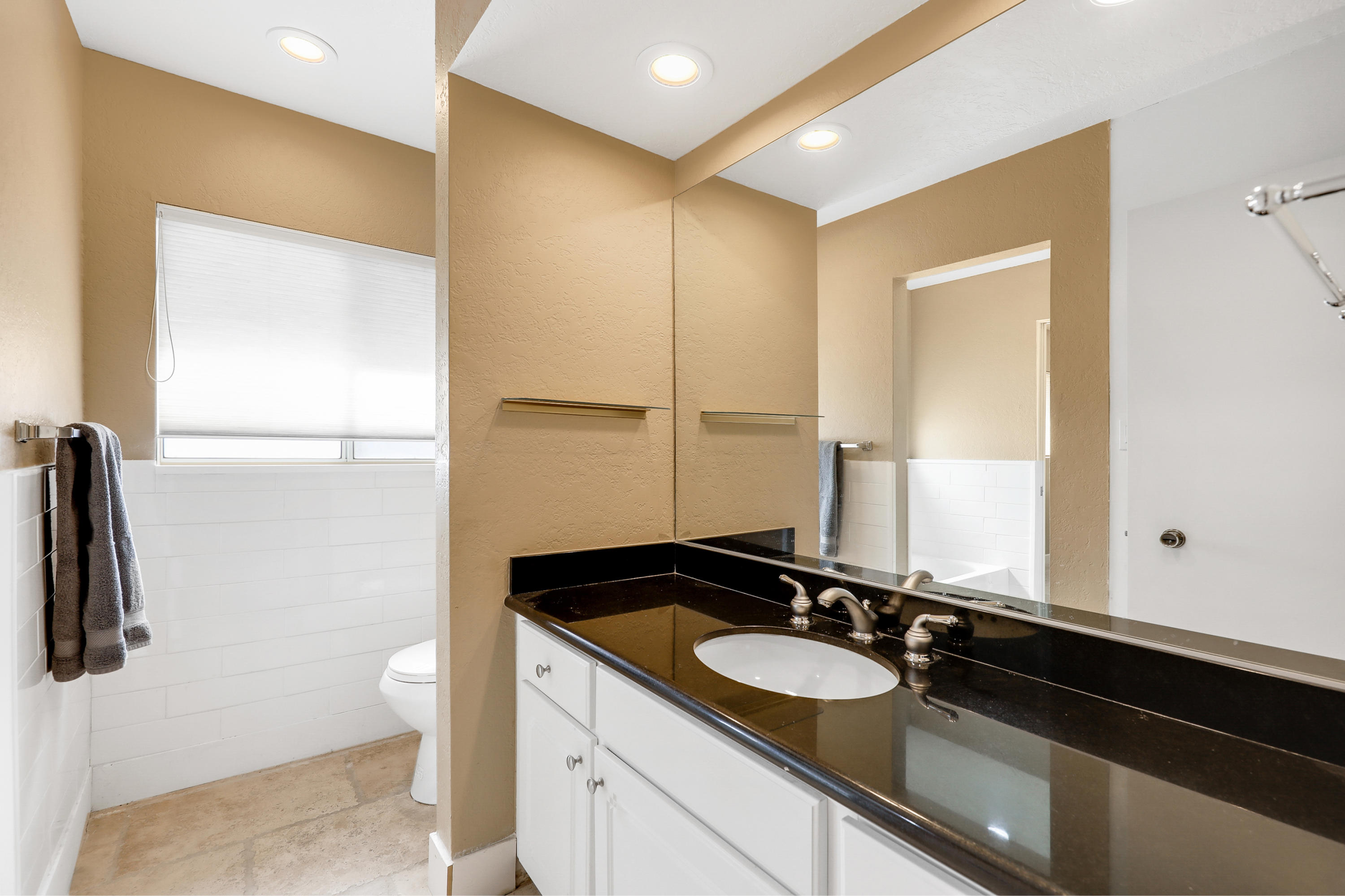 78950 Starlight Lane Bermuda Dunes, CA 92203 - Photo 20 of 32 a bathroom with a sink and a mirror