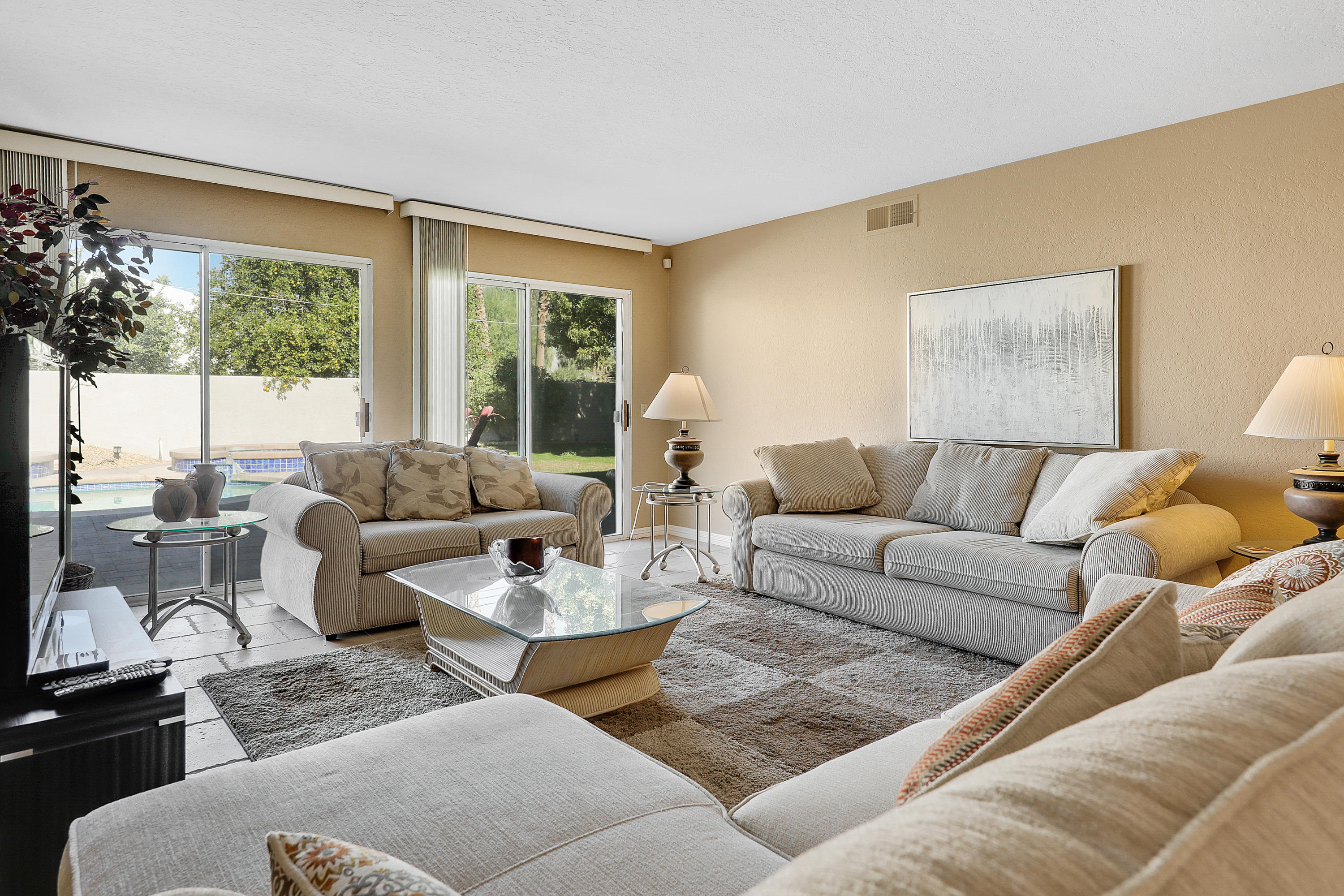 78950 Starlight Lane Bermuda Dunes, CA 92203 - Photo 26 of 32 a living room with furniture and a large window