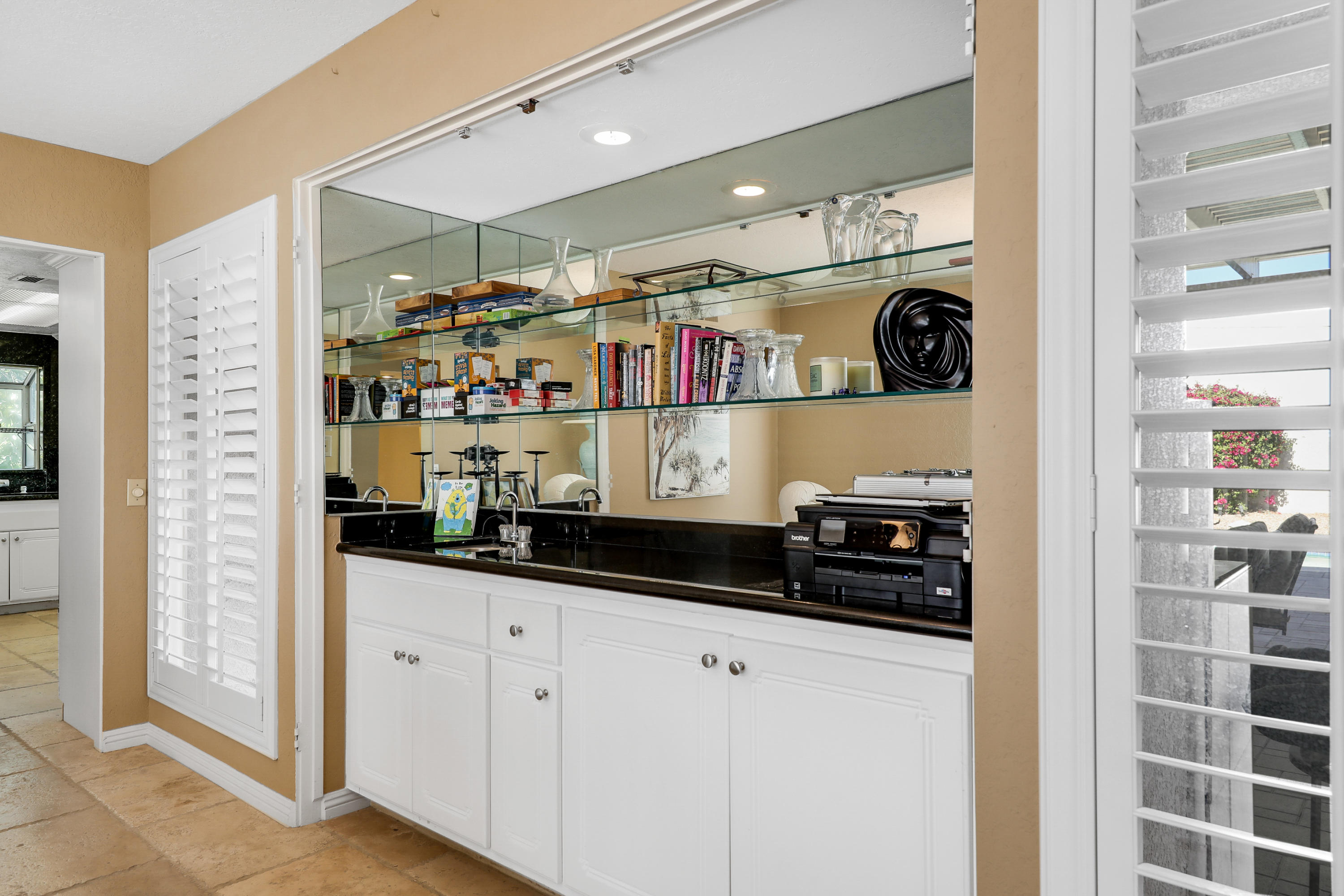 78950 Starlight Lane Bermuda Dunes, CA 92203 - Photo 7 of 32 a kitchen with stainless steel appliances a sink and cabinets