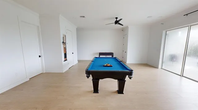 a room with pool table
