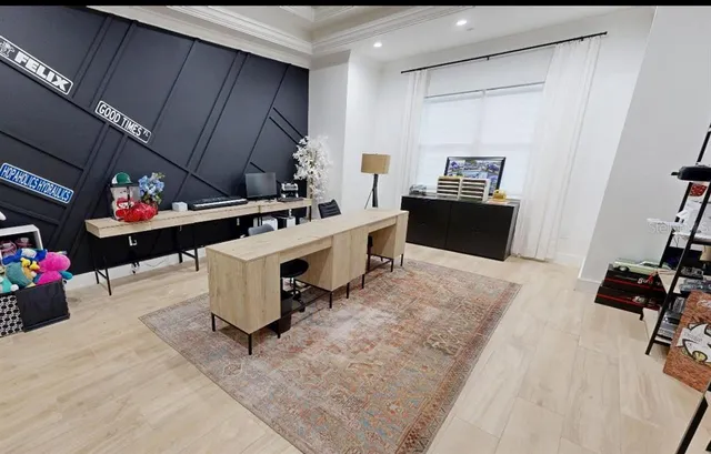 a kitchen with a stove and a refrigerator