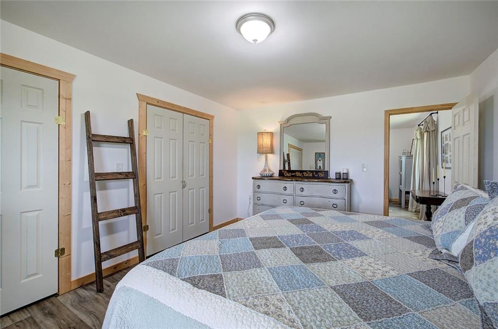 765 Addison Road Buchanan, GA 30113 - Photo 16 of 50 a bedroom with a bed and a view of bathroom