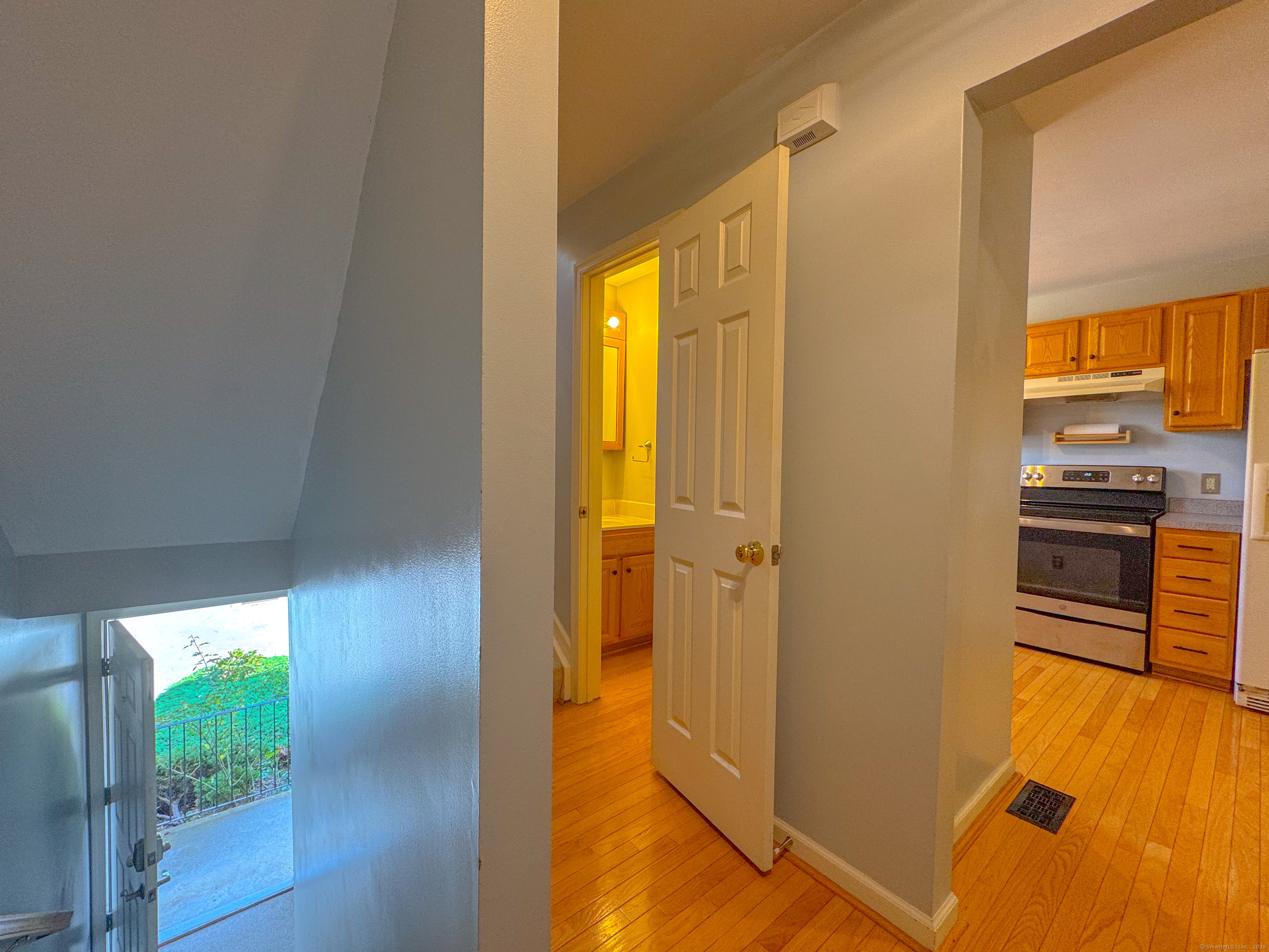 19 Hawthorne Drive, Unit 102 New London, CT 06320 - Photo 11 of 33 a view of a kitchen from the hallway