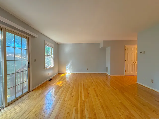 a view of an empty room and window