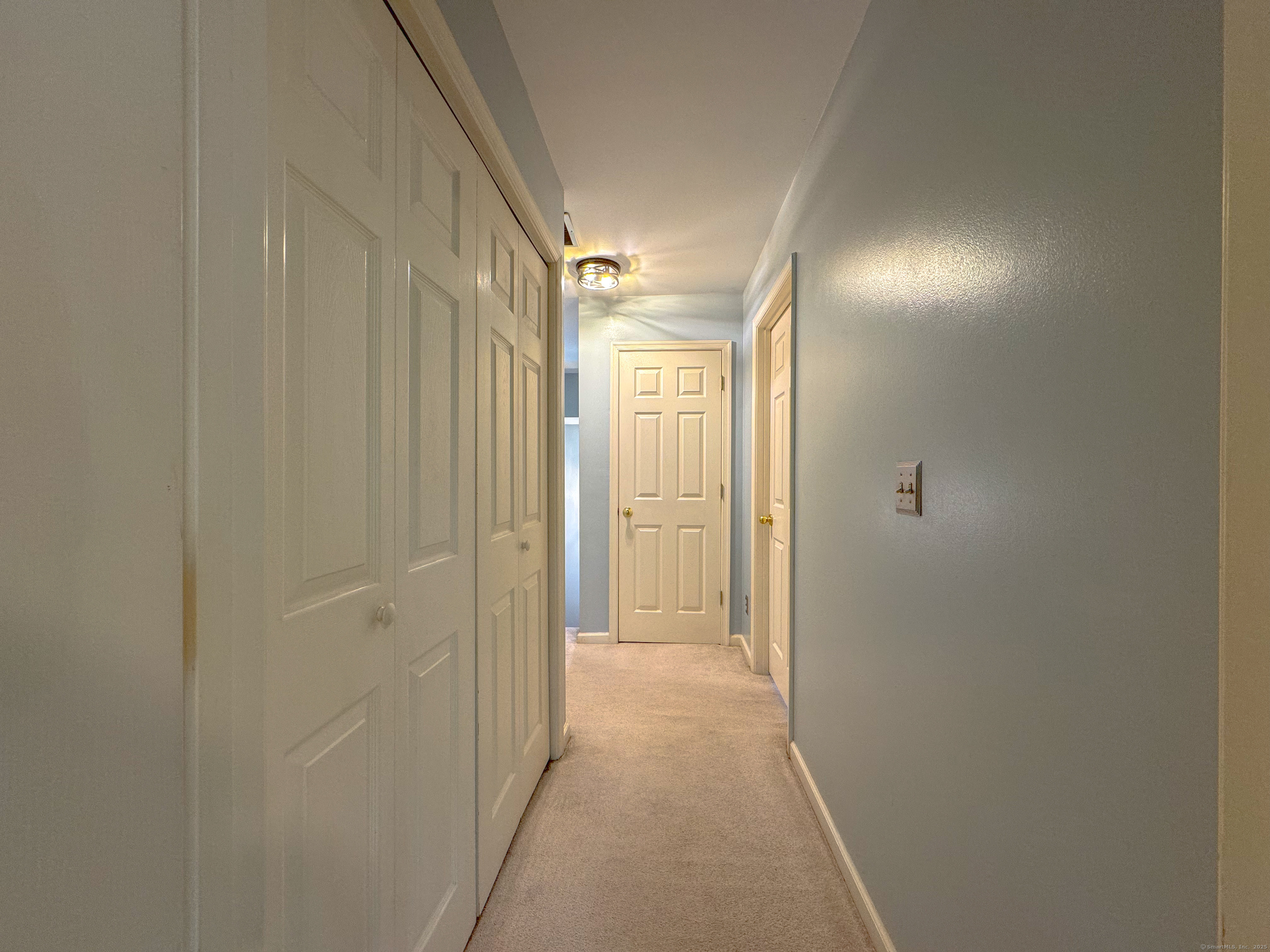 19 Hawthorne Drive, Unit 102 New London, CT 06320 - Photo 23 of 33 a view of a hallway