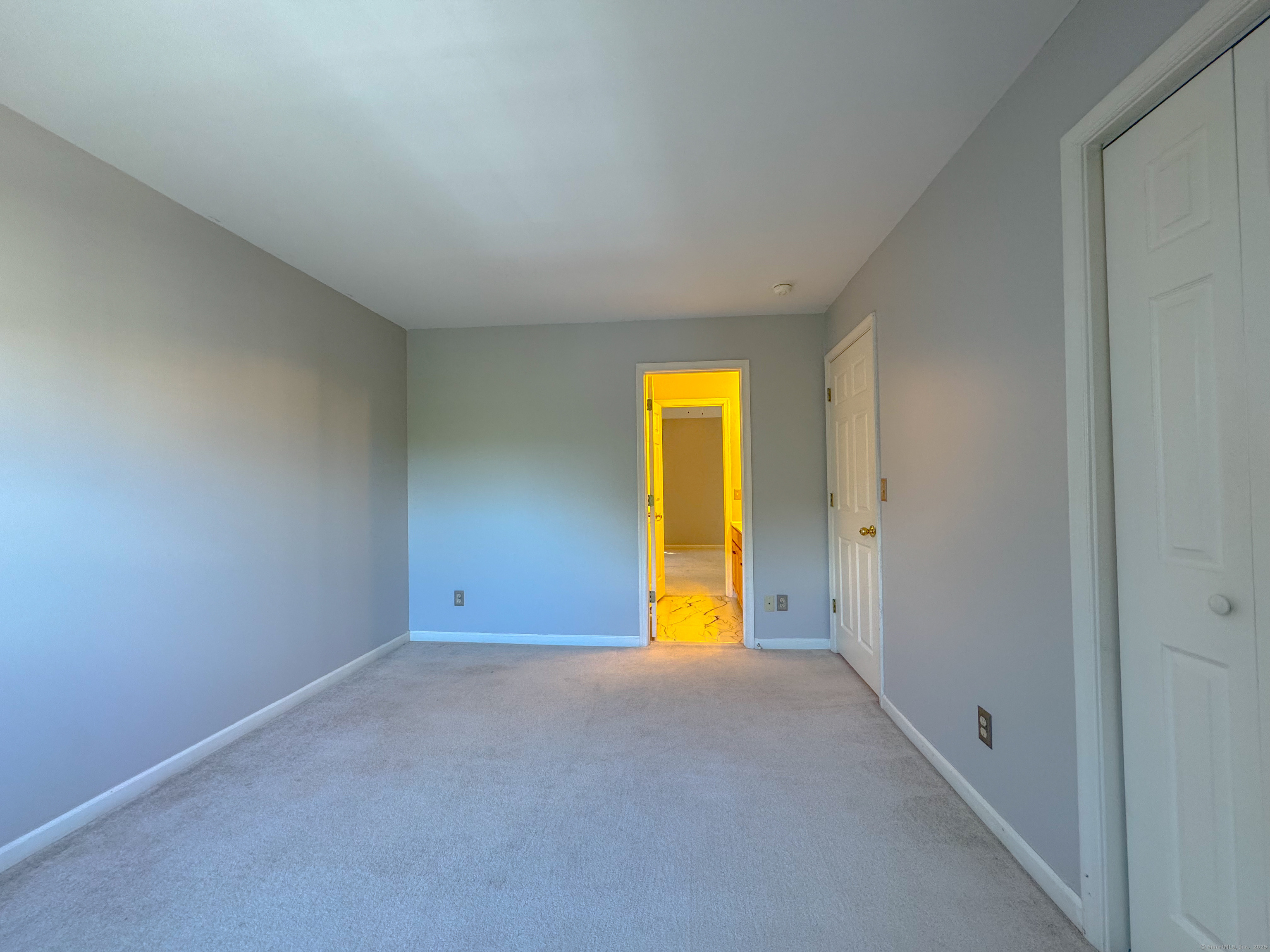 19 Hawthorne Drive, Unit 102 New London, CT 06320 - Photo 29 of 33 a view of empty room with a yard