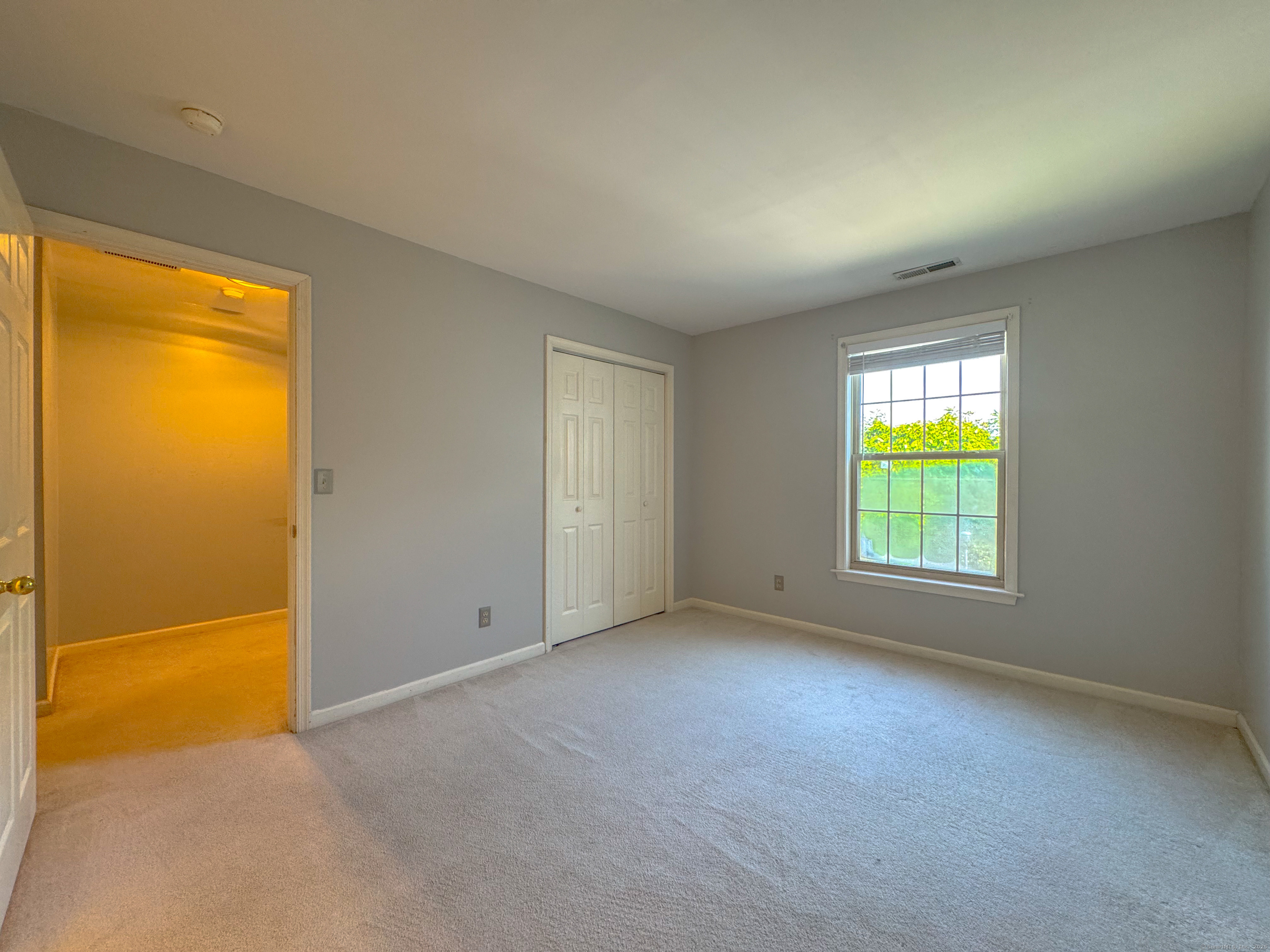 19 Hawthorne Drive, Unit 102 New London, CT 06320 - Photo 31 of 33 an empty room with window