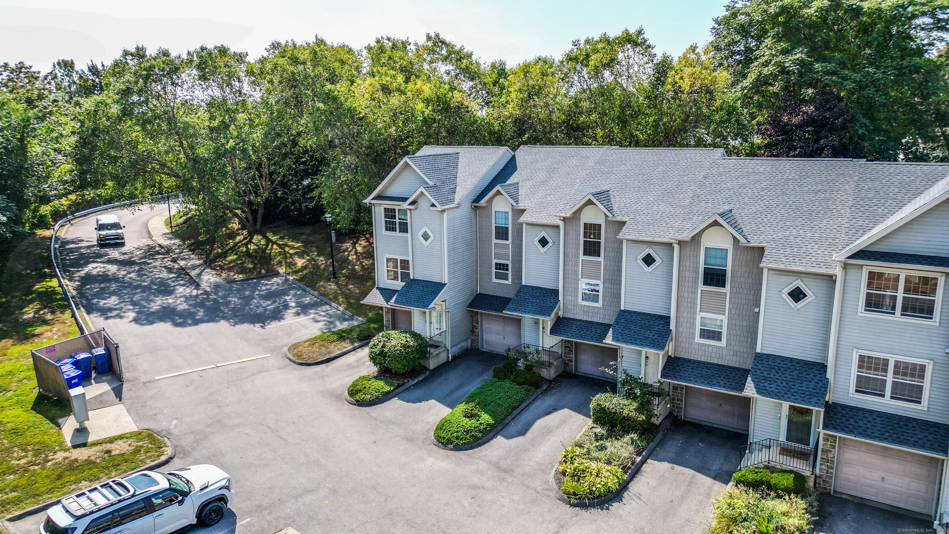 19 Hawthorne Drive, Unit 102 New London, CT 06320 - Photo 4 of 33 a view of a couches in patio of the house
