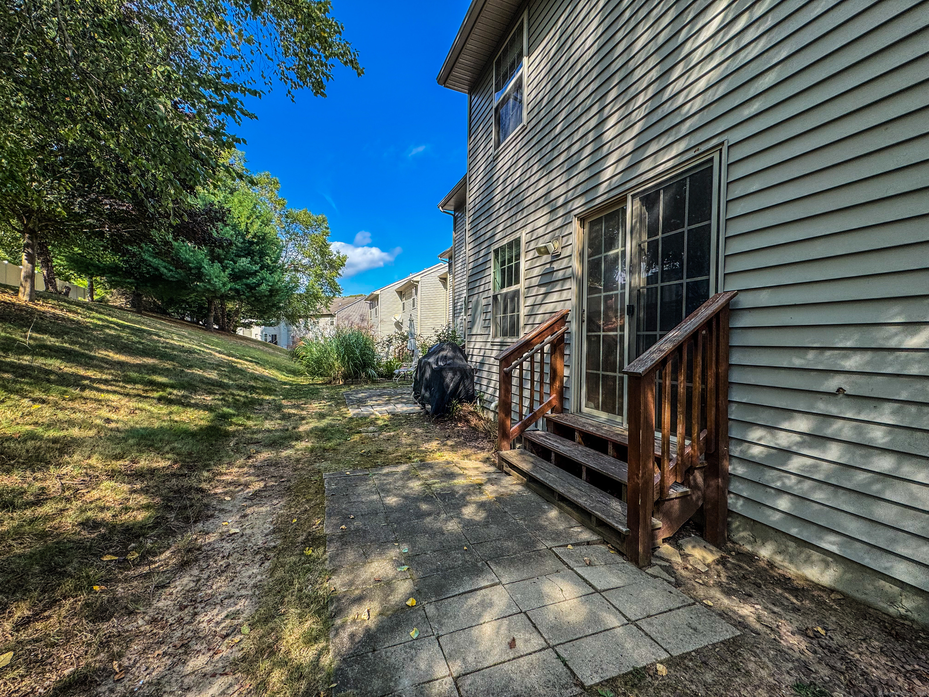 19 Hawthorne Drive, Unit 102 New London, CT 06320 - Photo 9 of 33 a view of a house with a yard