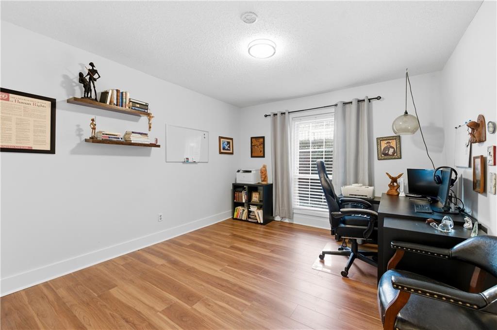 6851 Roswell Road, Unit F15 Atlanta, GA 30328 - Photo 20 of 31 a view of a workspace with furniture and a window