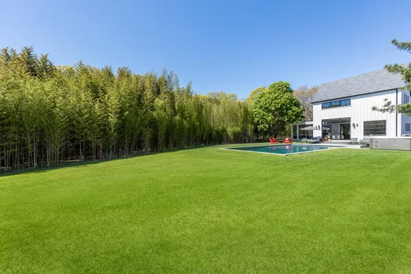 a view of a house with a big yard