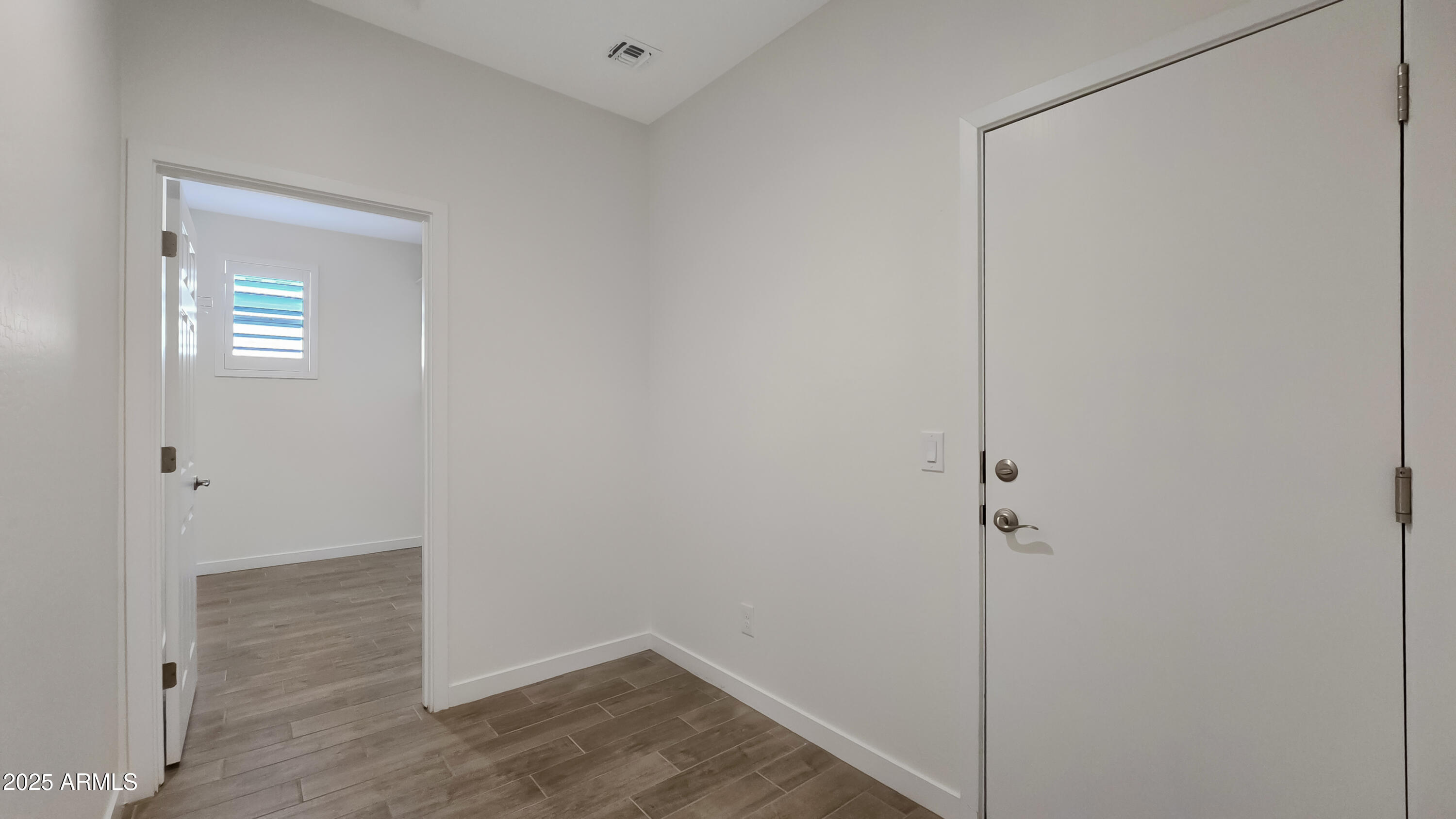 17864 West Thistle Landing Drive Goodyear, AZ 85338 - Photo 23 of 43 a view of small space with wooden floor
