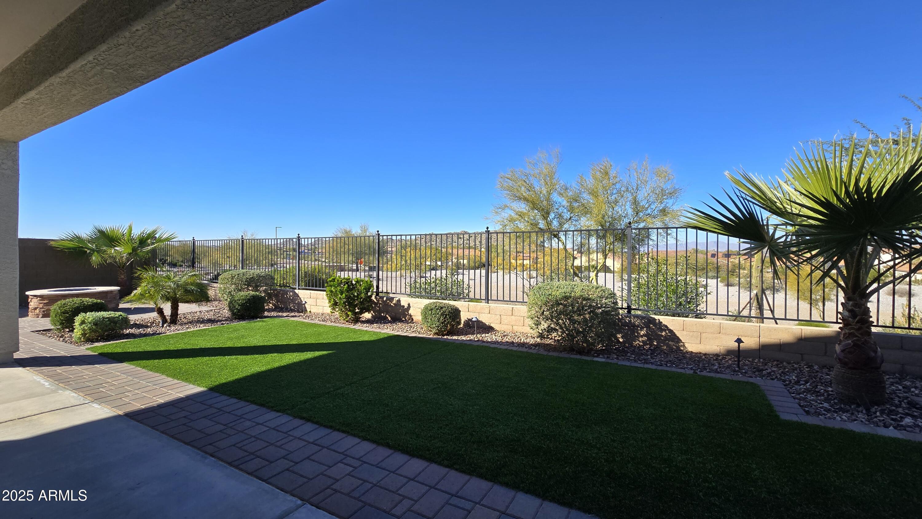17864 West Thistle Landing Drive Goodyear, AZ 85338 - Photo 29 of 43 a view of a backyard